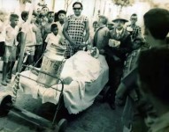 CHICO-DE-JANES_CARNAVAL-DE-ARACATI_Deitado-com-a-chupeta_GORGONHO_ano.webp